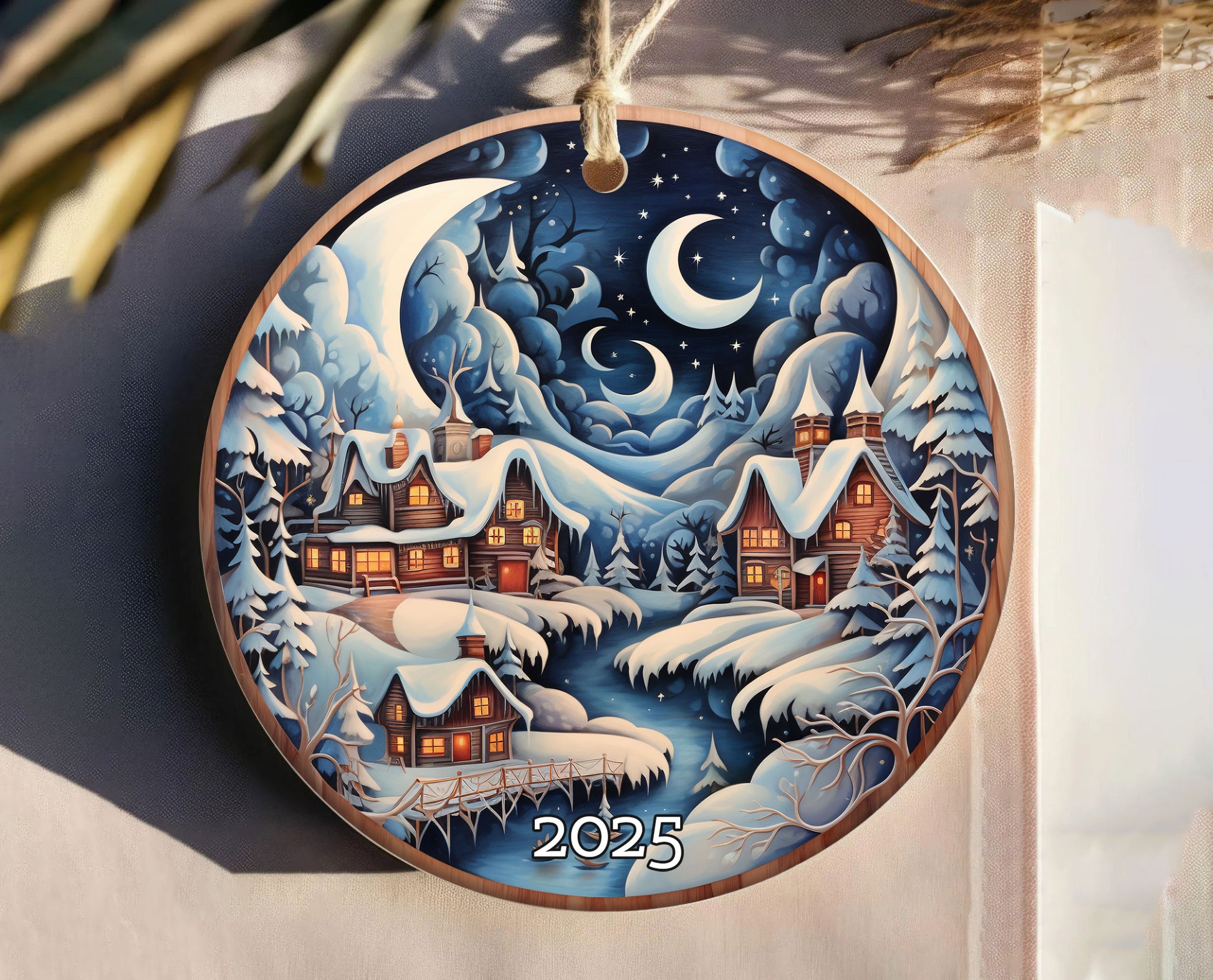 Snowy Village Under Moon and Stars Christmas Ornament